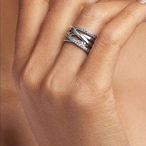 Never worn. Still in box size 7.5 Pandora ring.